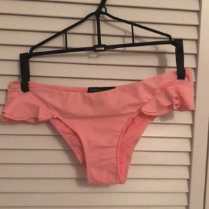 Salmon-colored ruffled bikini bottom